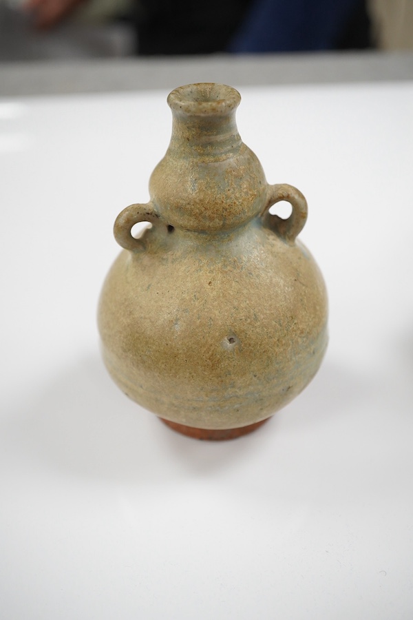 A Chinese blue and white jarlet and a Tang dynasty glazed jarlet, 9cm. Condition - commensurate with age